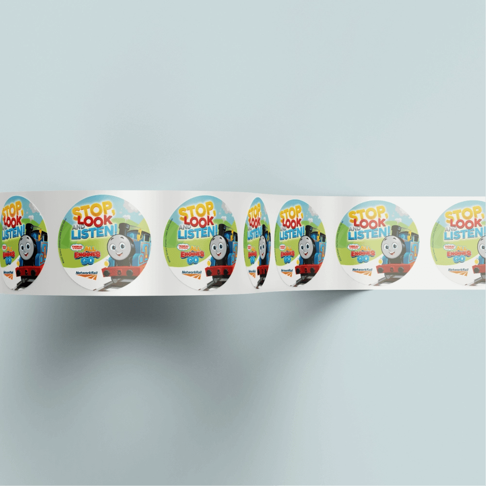 Stickers with the 'stop look and listen' branding.