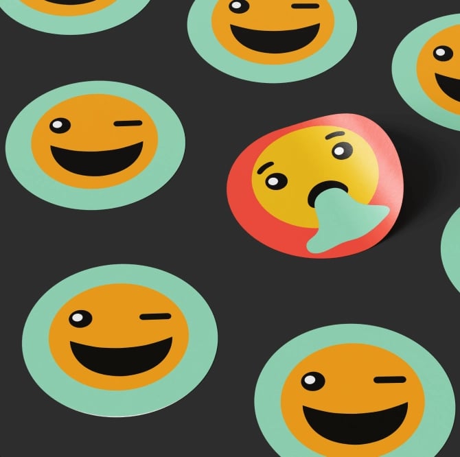 Stickers showing the winking and vomiting emoji.